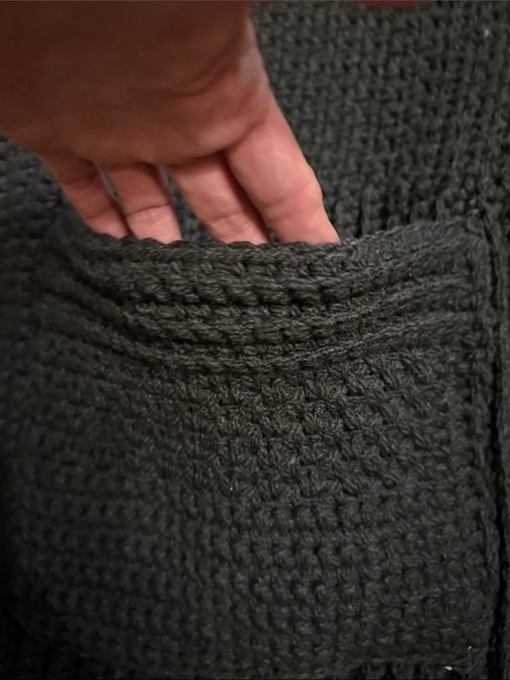 Artisan Black Ribbed Knit Throw Blanketwith pockets for storing things on couch
